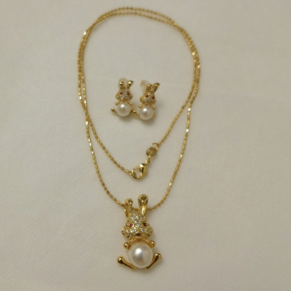 Freshwater pearl rabbits necklace and earrings set.